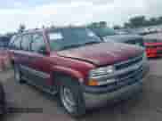 2002 Chevrolet Suburban LT z VIN 1GNEC16Z72J252681, wystawiony jako IAAI lot #42375392 z przebiegiem 312 135 mil mil oraz . Historia ofert i sprzedaży dostępna na DreamBid. Obrazek 1.