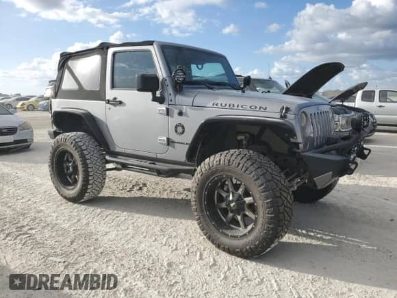 2015 Jeep Wrangler Rubicon z VIN 1C4BJWCG9FL542089, wystawiony jako Copart lot #76111634 z przebiegiem Nie podano mil oraz Nie do naprawy • Non repairable. Historia ofert i sprzedaży dostępna na DreamBid. Obrazek 4.