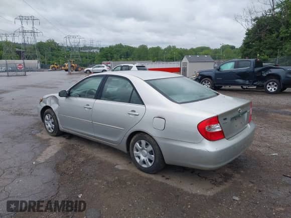 2004 Toyota Camry LE with VIN 4T1BE32K24U939042, listed as a IAAI auction lot 42324099 with 151,784 mi miles and . Bid and sale history available at DreamBid. Image 3.