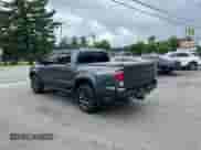2022 Toyota Tacoma Limited with VIN 3TMGZ5AN7NM458988, listed as a Copart auction lot 61864835 with 32,115 mi miles and Salvage title. Bid and sale history available at DreamBid. Image 3.