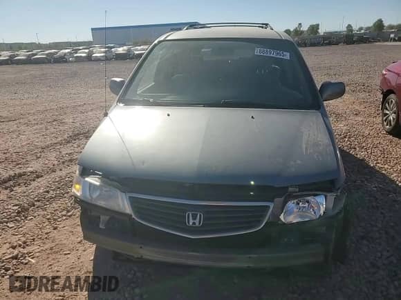 1999 Honda Odyssey EX с VIN 2HKRL1860XH541737, выставлен на аукционе Copart как лот 88897965 с пробегом 112 164 миль миль и Списание • Salvage title. История ставок и продаж доступна на DreamBid. Изображение 11.