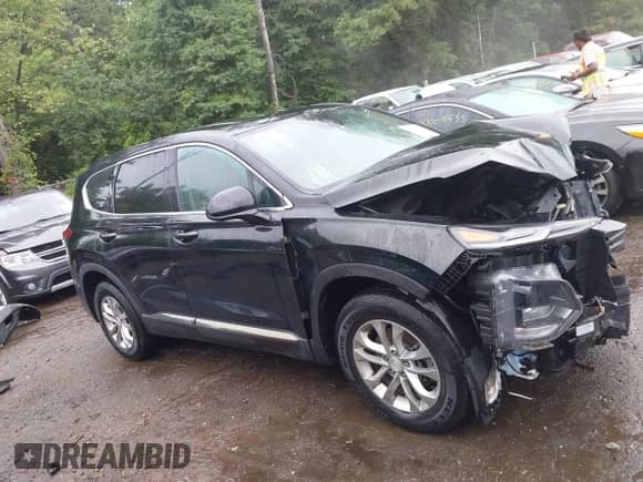 2019 Hyundai Santa Fe SEL with VIN 5NMS3CAD7KH131884, listed as a IAAI auction lot 43025635 with 70,150 mi miles and . Bid and sale history available at DreamBid. Image 14.