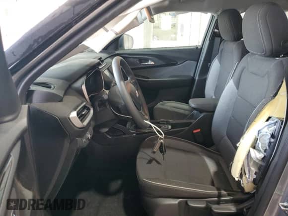 2023 Chevrolet TrailBlazer LS with VIN KL79MNSL5PB196187, listed as a Copart auction lot 63017205 with 28,404 mi miles and Salvage title. Bid and sale history available at DreamBid. Image 7.