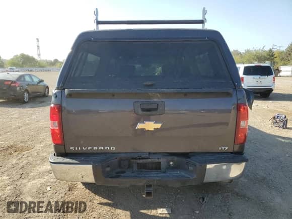 2011 Chevrolet Silverado 1500 LTZ with VIN 3GCPKTE32BG162899, listed as a Copart auction lot 83950435 with 136,170 mi miles and Salvage title. Bid and sale history available at DreamBid. Image 6.