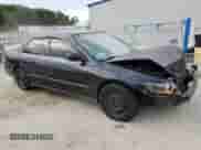 2000 Honda Accord LX z VIN 1HGCG6555YA130086, wystawiony jako Copart lot #68388535 z przebiegiem 221 560 mil mil oraz Szkoda całkowita • Salvage title. Historia ofert i sprzedaży dostępna na DreamBid. Obrazek 4.