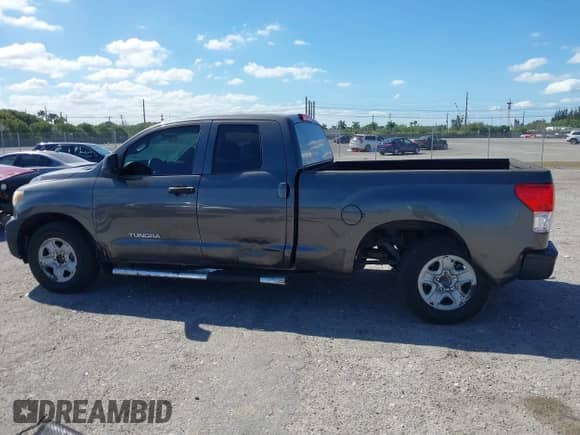 2012 Toyota Tundra z VIN 5TFRU5F19CX026861, wystawiony jako IAAI lot #41827542 z przebiegiem 135 428 mil mil oraz . Historia ofert i sprzedaży dostępna na DreamBid. Obrazek 14.