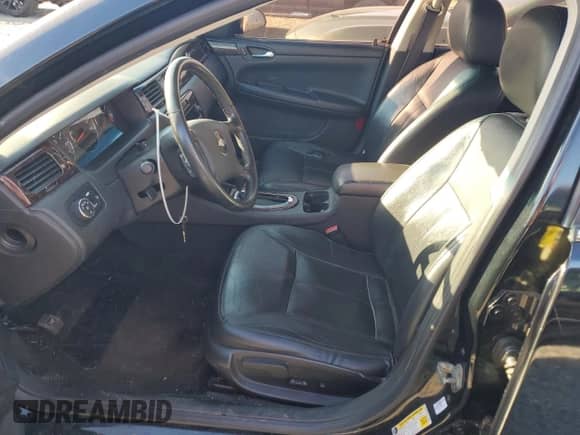 2012 Chevrolet Impala LTZ with VIN 2G1WC5E39C1148683, listed as a Copart auction lot 71614415 with 147,078 mi miles and Salvage title. Bid and sale history available at DreamBid. Image 7.