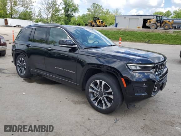 2023 Jeep Grand Cherokee Overland z VIN 1C4RJHDG0PC670537, wystawiony jako Copart lot #56757285 z przebiegiem 24 735 mil mil oraz Szkoda całkowita • Salvage title. Historia ofert i sprzedaży dostępna na DreamBid. Obrazek 4.