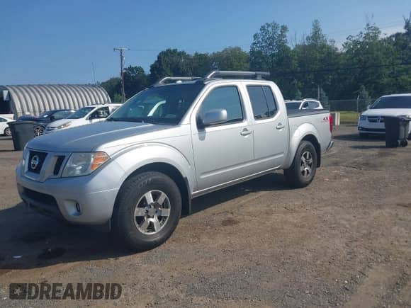 2011 Nissan Frontier Pro-4X with VIN 1N6AD0EV2BC439373, listed as a IAAI auction lot 42795441 with 250,992 mi miles and . Bid and sale history available at DreamBid. Image 17.