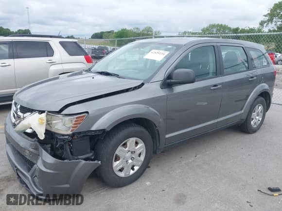 2012 Dodge Journey American Value with VIN 3C4PDCAB8CT206985, listed as a IAAI auction lot 42529224 with 129,359 mi miles and . Bid and sale history available at DreamBid. Image 2.