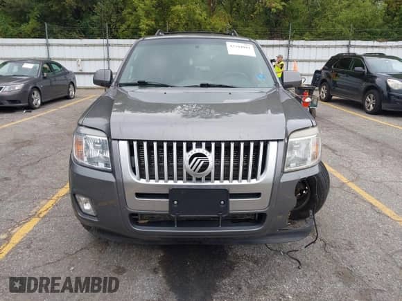 2010 Mercury Mariner Premier with VIN 4M2CN9H70AKJ30462, listed as a IAAI auction lot 43264181 with 169,789 mi miles and . Bid and sale history available at DreamBid. Image 12.