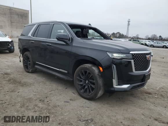 2021 Cadillac Escalade Premium Luxury with VIN 1GYS4BKL9MR215159, listed as a Copart auction lot 48577415 with 50,773 mi miles and Salvage title. Bid and sale history available at DreamBid. Image 4.