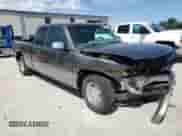 2000 GMC Sierra 1500 SLE with VIN 1GTEC19V3YZ352742, listed as a Copart auction lot 57746955 with 194,947 mi miles and Salvage title. Bid and sale history available at DreamBid. Image 4.