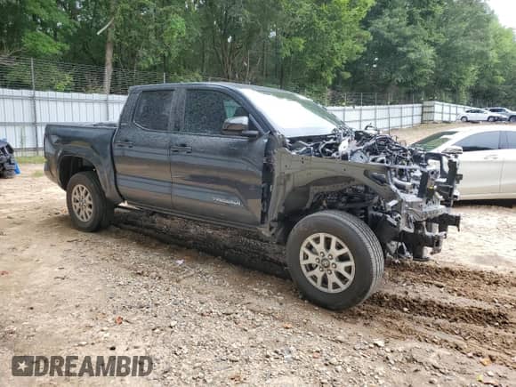 2024 Toyota Tacoma SR5 with VIN 3TYKB5FN9RT006669, listed as a Copart auction lot 65547975 with Not provided miles and Salvage title. Bid and sale history available at DreamBid. Image 4.