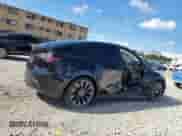 2023 Tesla Model Y Performance с VIN 7SAYGDEF0PF660573, выставлен на аукционе Copart как лот 80920165 с пробегом 24 525 миль миль и На запчасти • Non repairable. История ставок и продаж доступна на DreamBid. Изображение 3.