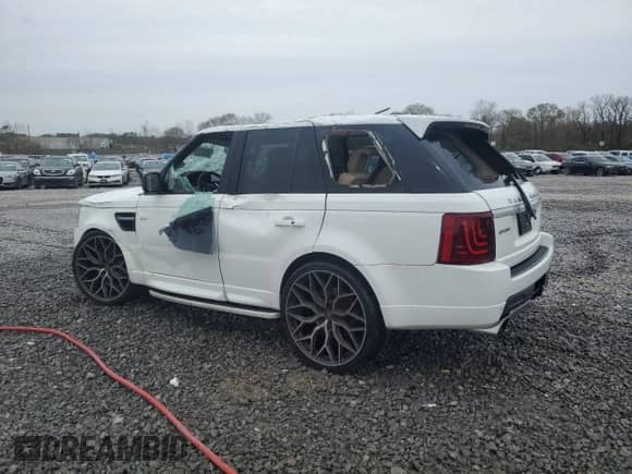 2013 Land Rover Range Rover Sport SC with VIN SALSH2E48DA803737, listed as a Copart auction lot 50303275 with 127,712 mi miles and Salvage title. Bid and sale history available at DreamBid. Image 2.