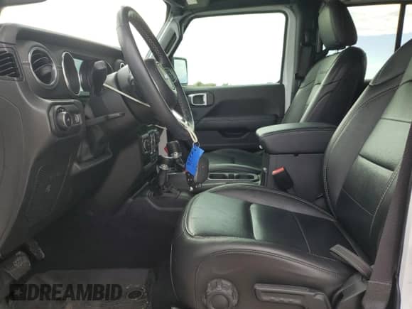 2023 Jeep Wrangler Sahara Altitude with VIN 1C4HJXEG5PW570629, listed as a Copart auction lot 80860234 with 15,121 mi miles and Salvage title. Bid and sale history available at DreamBid. Image 7.