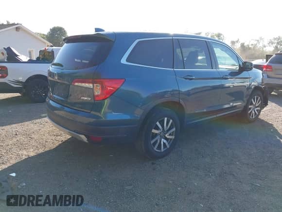 2021 Honda Pilot EX-L с VIN 5FNYF6H57MB016725, выставлен на аукционе IAAI как лот 43084698 с пробегом 111 812 миль миль и . История ставок и продаж доступна на DreamBid. Изображение 4.