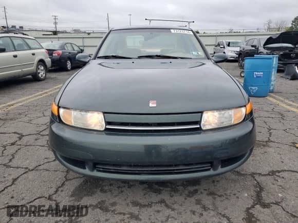 2001 Saturn LS with VIN 1G8JU54F41Y581083, listed as a Copart auction lot 73123714 with 98,500 mi miles and Salvage title. Bid and sale history available at DreamBid. Image 5.