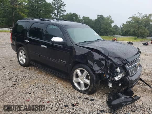 2011 Chevrolet Tahoe LS z VIN 1GNSCAE04BR398186, wystawiony jako Copart lot #62933735 z przebiegiem 195 635 mil mil oraz Szkoda całkowita • Salvage title. Historia ofert i sprzedaży dostępna na DreamBid. Obrazek 4.