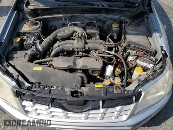 2012 Subaru Forester X Limited z VIN JF2SHAEC5CH444962, wystawiony jako Copart lot #68594975 z przebiegiem 198 976 mil mil oraz Szkoda całkowita • Salvage title. Historia ofert i sprzedaży dostępna na DreamBid. Obrazek 11.