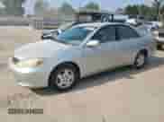 2002 Toyota Camry XLE with VIN 4T1BF32K12U530685, listed as a Copart auction lot 66261805 with 209,808 mi miles and Salvage title. Bid and sale history available at DreamBid. Image 1.