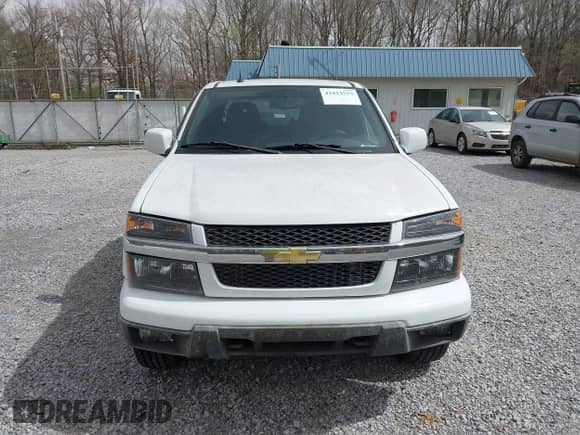 2011 Chevrolet Colorado 1LT z VIN 1GCHTCFE6B8141559, wystawiony jako IAAI lot #41812559 z przebiegiem 147 848 mil mil oraz . Historia ofert i sprzedaży dostępna na DreamBid. Obrazek 12.