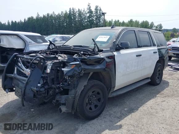 2019 Chevrolet Tahoe Commercial z VIN 1GNLCDEC3KR323012, wystawiony jako IAAI lot #42517025 z przebiegiem 40 412 mil mil oraz . Historia ofert i sprzedaży dostępna na DreamBid. Obrazek 19.