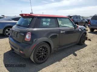 2013 MINI Hardtop John Cooper Works with VIN WMWSU9C58DT722617, listed as a Copart auction lot 57356095 with 202,230 mi miles and Salvage title. Bid and sale history available at DreamBid. Image 3.