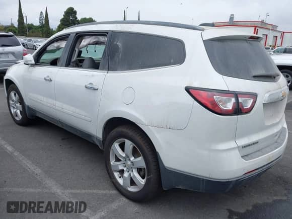 2017 Chevrolet Traverse LT z VIN 1GNKRGKD2HJ187505, wystawiony jako IAAI lot #43299284 z przebiegiem 80 256 mil mil oraz . Historia ofert i sprzedaży dostępna na DreamBid. Obrazek 3.