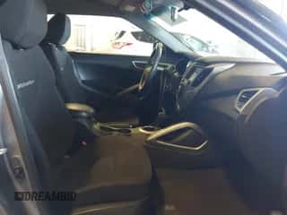 2015 Hyundai Veloster with VIN KMHTC6AD0FU244981, listed as a IAAI auction lot 42877541 with 64,213 mi miles and . Bid and sale history available at DreamBid. Image 5.