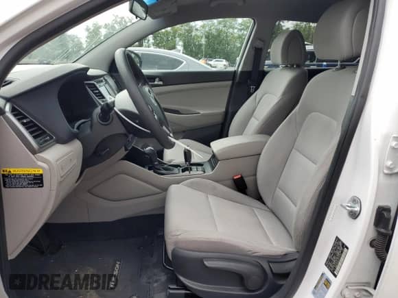 2018 Hyundai Tucson SE z VIN KM8J23A45JU727075, wystawiony jako Copart lot #72063095 z przebiegiem 82 864 mil mil oraz Szkoda całkowita • Salvage title. Historia ofert i sprzedaży dostępna na DreamBid. Obrazek 7.