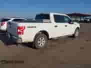 2019 Ford F-150 XL with VIN 1FTEW1E57KFA46035, listed as a IAAI auction lot 43026816 with 129,079 mi miles and . Bid and sale history available at DreamBid. Image 4.