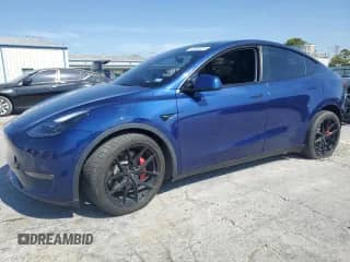 2023 Tesla Model Y Performance z VIN 7SAYGDEF0PF697106, wystawiony jako Copart lot #85683825 z przebiegiem 56 253 mil mil oraz Czysty tytuł • Clean title. Historia ofert i sprzedaży dostępna na DreamBid. Obrazek 1.