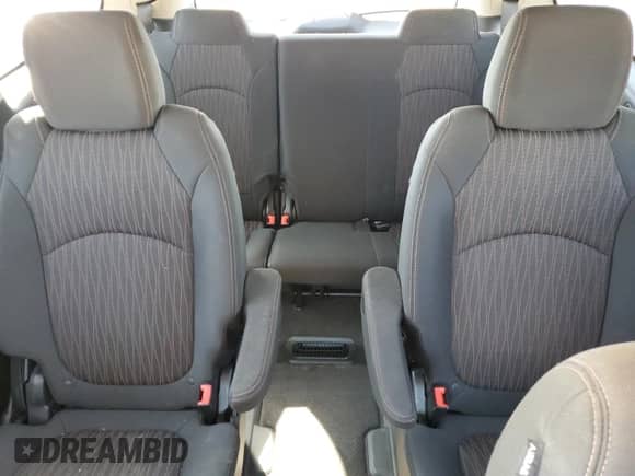 2015 Chevrolet Traverse LT с VIN 1GNKRGKD8FJ253584, выставлен на аукционе Copart как лот 81155075 с пробегом 82 095 миль миль и Списание • Salvage title. История ставок и продаж доступна на DreamBid. Изображение 10.