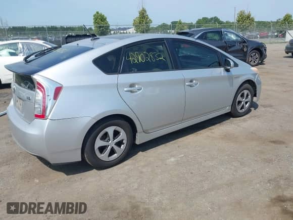 2012 Toyota Prius One with VIN JTDKN3DU7C5390224, listed as a IAAI auction lot 42902832 with 215,080 mi miles and . Bid and sale history available at DreamBid. Image 4.