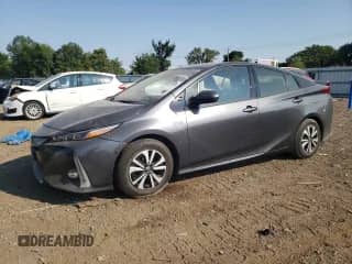 2018 Toyota Prius Plus z VIN JTDKARFP1J3100462, wystawiony jako Copart lot #80514995 z przebiegiem 70 669 mil mil oraz Szkoda całkowita • Salvage title. Historia ofert i sprzedaży dostępna na DreamBid. Obrazek 1.