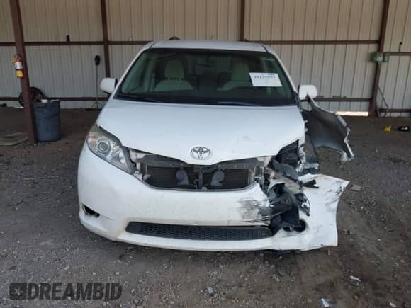2014 Toyota Sienna LE with VIN 5TDKK3DC6ES508311, listed as a IAAI auction lot 43235557 with 253,129 mi miles and . Bid and sale history available at DreamBid. Image 12.