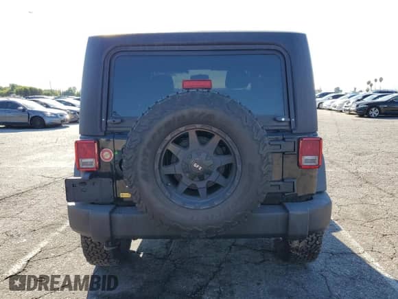 2011 Jeep Wrangler Sport z VIN 1J4AA2D13BL511360, wystawiony jako Copart lot #84042125 z przebiegiem 97 521 mil mil oraz Szkoda całkowita • Salvage title. Historia ofert i sprzedaży dostępna na DreamBid. Obrazek 6.