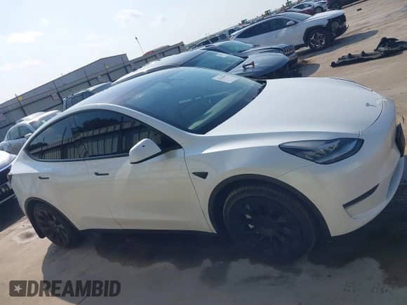 2022 Tesla Model Y Long Range z VIN 7SAYGDEE1NA003346, wystawiony jako IAAI lot #42966899 z przebiegiem 86 422 mil mil oraz . Historia ofert i sprzedaży dostępna na DreamBid. Obrazek 13.