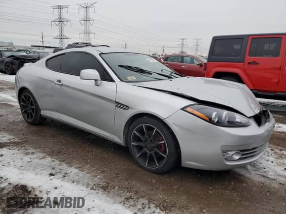 2008 Hyundai Tiburon GS с VIN KMHHM66D48U292160, выставлен на аукционе Copart как лот 84760964 с пробегом 114 878 миль миль и Списание • Salvage title. История ставок и продаж доступна на DreamBid. Изображение 4.