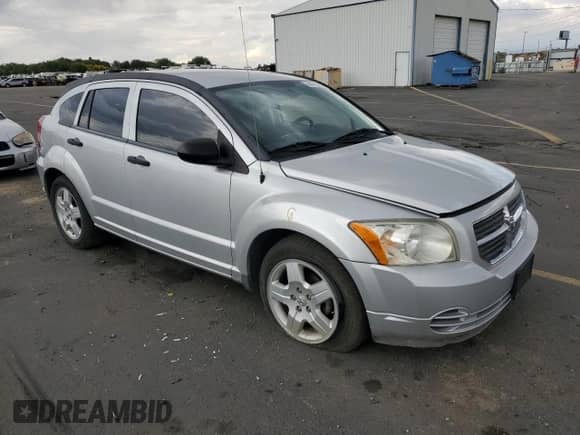 2008 Dodge Caliber SXT with VIN 1B3HB48B38D754624, listed as a Copart auction lot 84799085 with 137,663 mi miles and Salvage title. Bid and sale history available at DreamBid. Image 4.