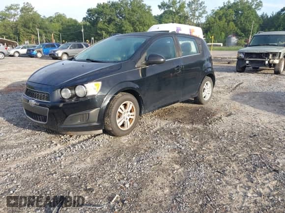2012 Chevrolet Sonic LT with VIN 1G1JC6SB1C4205460, listed as a IAAI auction lot 42911734 with 108,224 mi miles and . Bid and sale history available at DreamBid. Image 2.