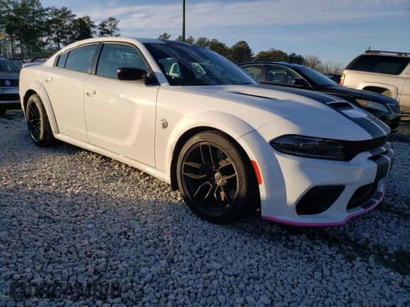 2023 Dodge Charger SRT Hellcat Redeye Widebody with VIN 2C3CDXL92PH630519, listed as a Copart auction lot 83360544 with 12,389 mi miles and Salvage title. Bid and sale history available at DreamBid. Image 4.