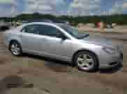 2011 Chevrolet Malibu 1LS z VIN 1G1ZB5E11BF249559, wystawiony jako Copart lot #71526365 z przebiegiem 150 772 mil mil oraz Szkoda całkowita • Salvage title. Historia ofert i sprzedaży dostępna na DreamBid. Obrazek 4.