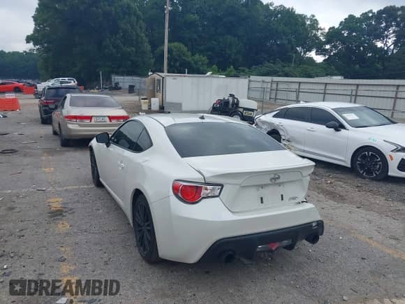 2014 Scion FR-S z VIN JF1ZNAA1XE9705936, wystawiony jako IAAI lot #42641834 z przebiegiem 86 705 mil mil oraz . Historia ofert i sprzedaży dostępna na DreamBid. Obrazek 3.