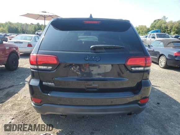 2018 Jeep Grand Cherokee Laredo E with VIN 1C4RJFAG8JC482378, listed as a Copart auction lot 71685435 with 74,430 mi miles and Salvage title. Bid and sale history available at DreamBid. Image 6.