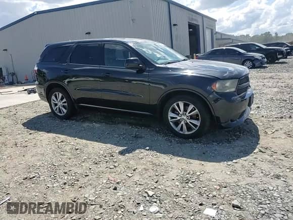 2012 Dodge Durango R/T with VIN 1C4SDJCTXCC320051, listed as a Copart auction lot 66534935 with 216,311 mi miles and Salvage title. Bid and sale history available at DreamBid. Image 14.
