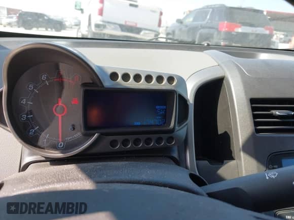 2012 Chevrolet Sonic LT with VIN 1G1JD5SH7C4160567, listed as a IAAI auction lot 41692728 with 174,702 mi miles and . Bid and sale history available at DreamBid. Image 7.