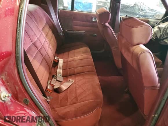 1991 Dodge Spirit with VIN 1B3XA46K7MF556659, listed as a Copart auction lot 63274095 with 107,254 mi miles and Salvage title. Bid and sale history available at DreamBid. Image 10.
